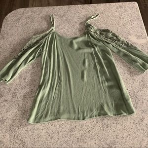 Green open shoulder shirt